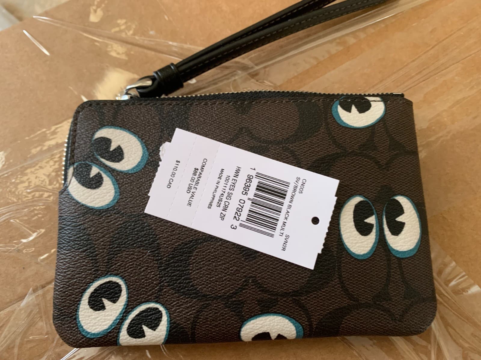 Coach small wristlet wallet Eyes NWT